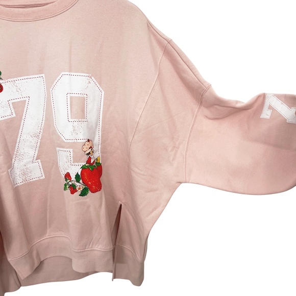 NWOT Strawberry Shortcake Oversized 79 Graphic Sweatshirt with Front Hem Slits - Picture 6 of 11